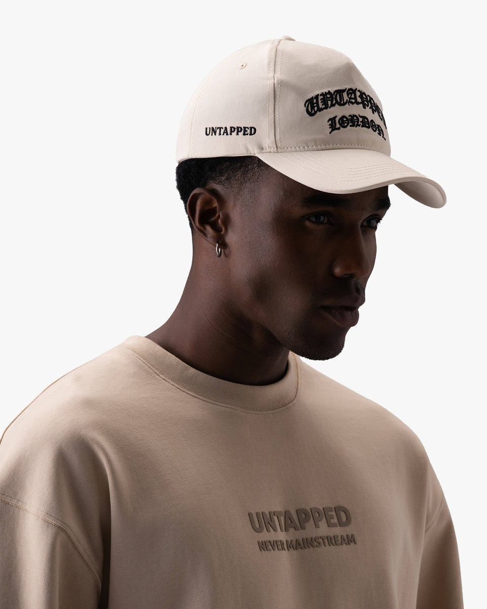 Untapped London London Script Cap in Stone Beige, structured cotton twill cap