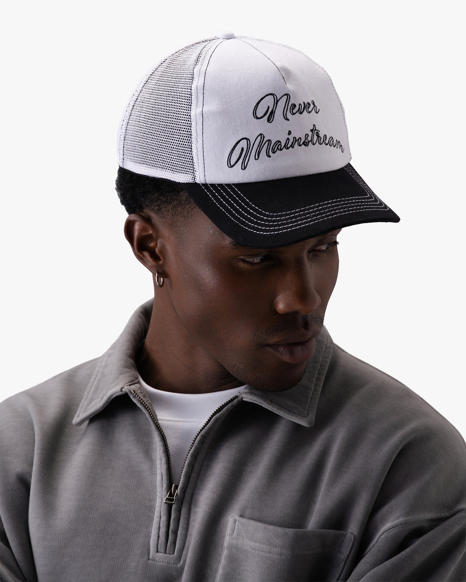 Untapped London Never Mainstream Trucker cap in Stone Beige, cotton twill and mesh