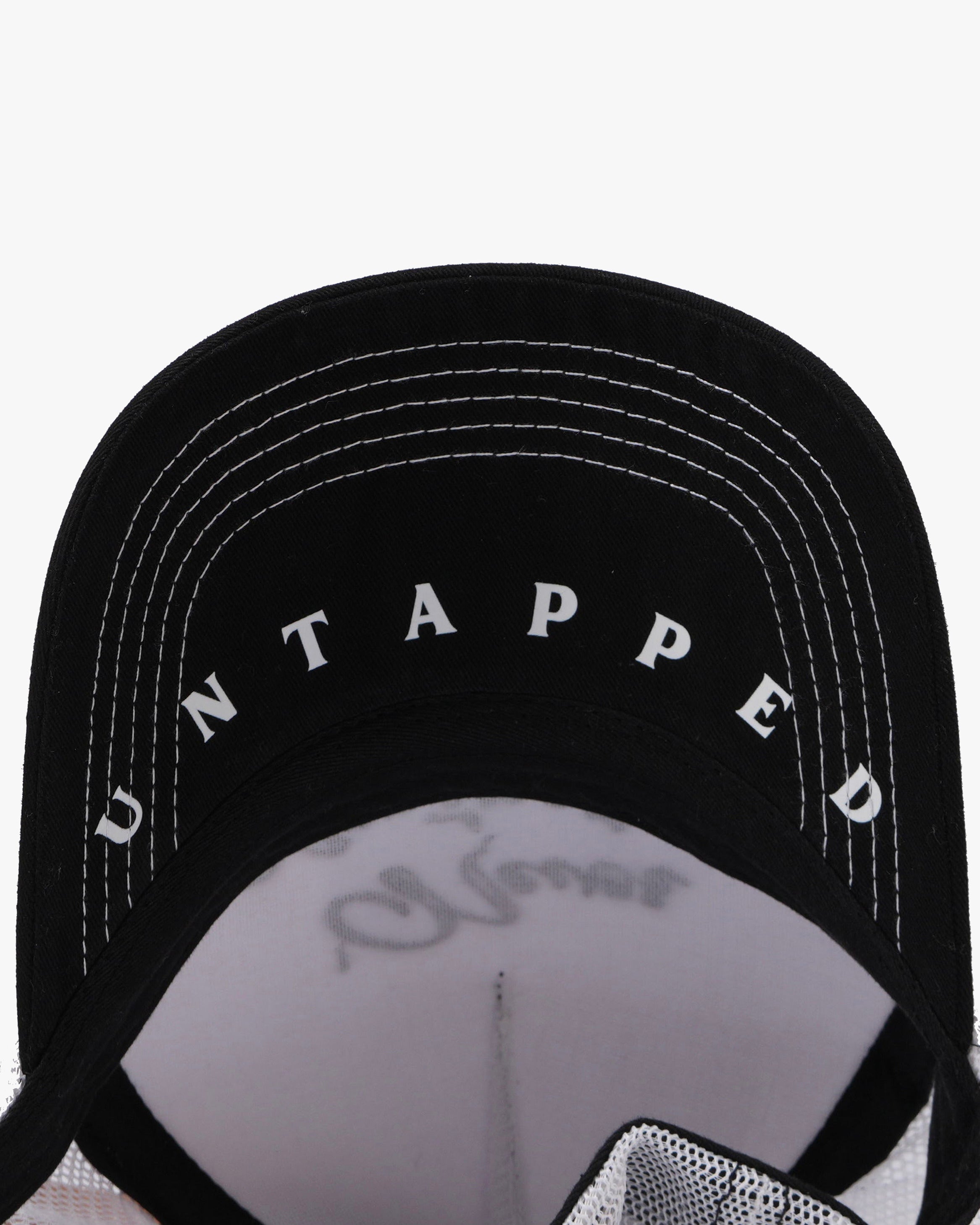 Untapped London Never Mainstream Trucker cap in Stone Beige, cotton twill and mesh
