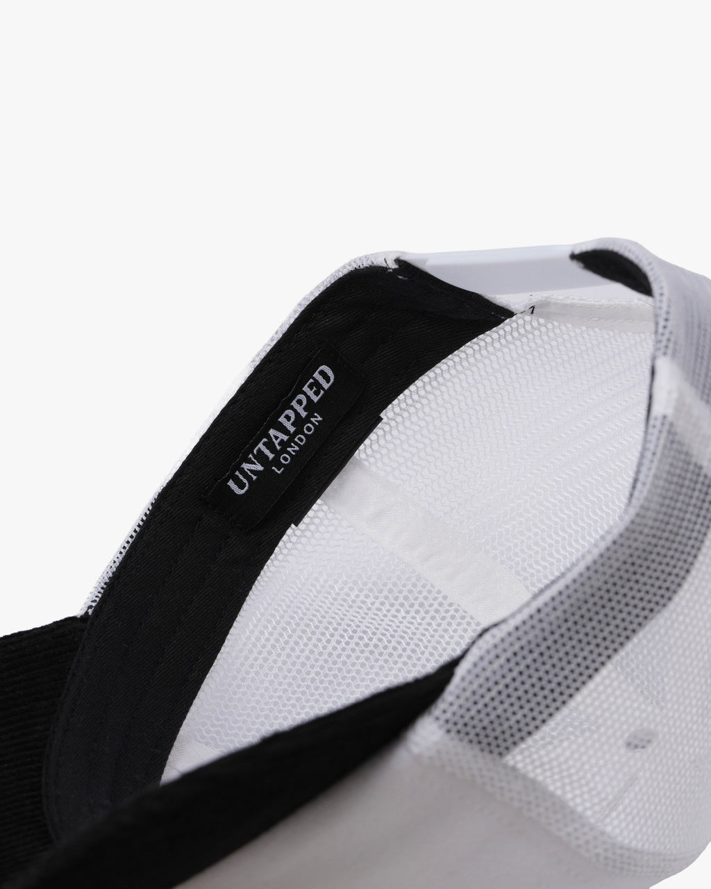 Untapped London Never Mainstream Trucker cap in Stone Beige, cotton twill and mesh