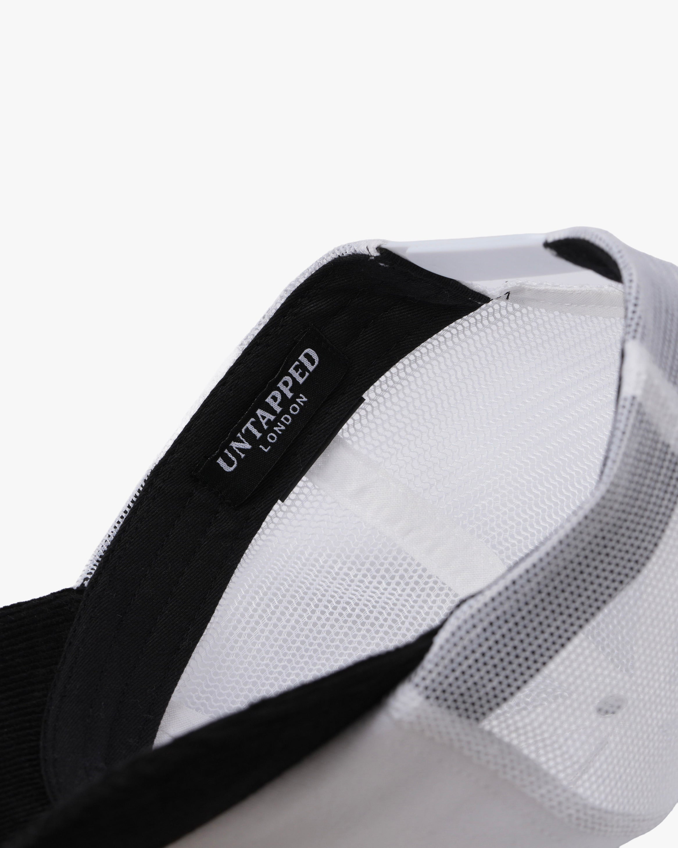 Untapped London Never Mainstream Trucker cap in Stone Beige, cotton twill and mesh