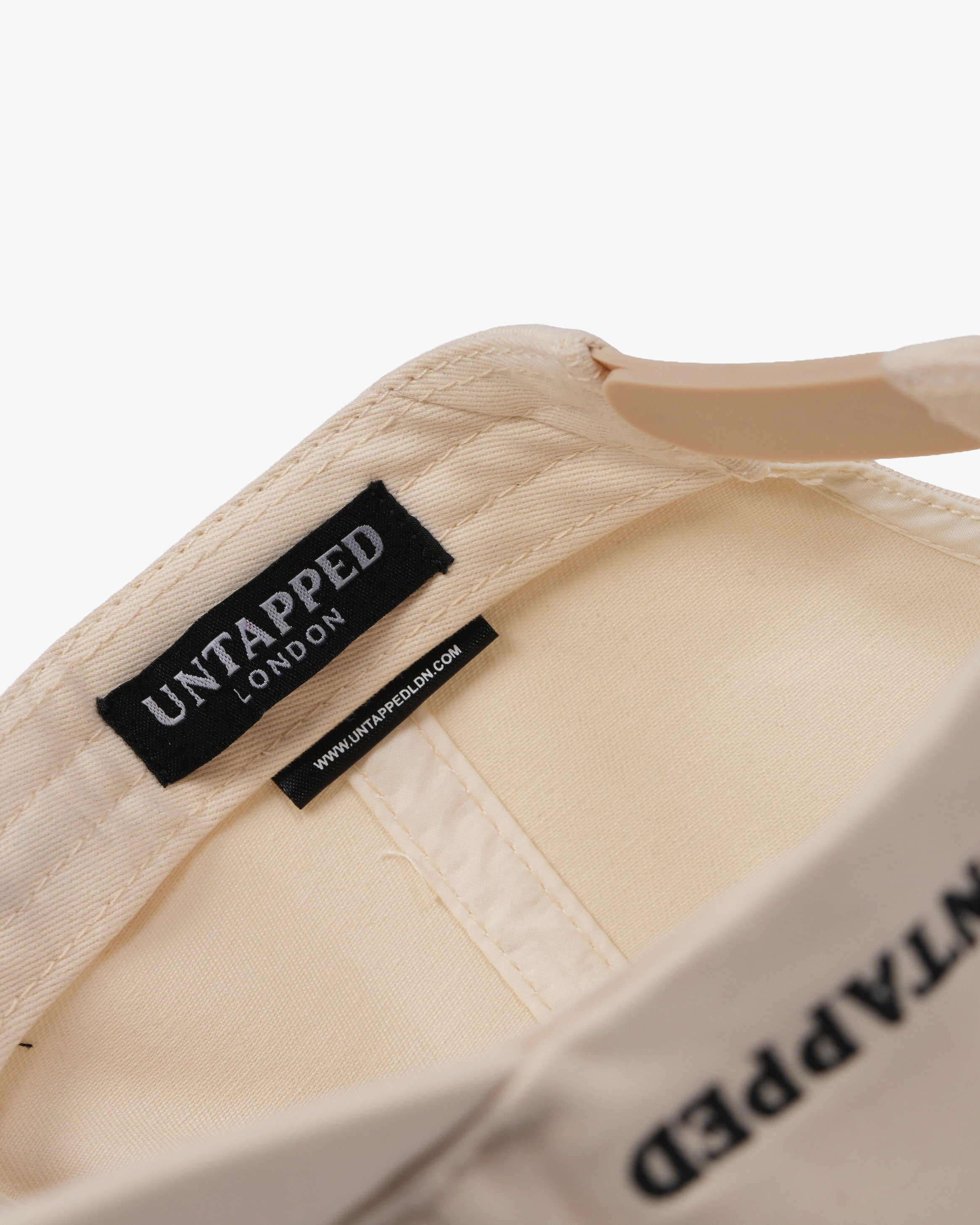 Untapped London London Script Cap in Stone Beige, structured cotton twill cap